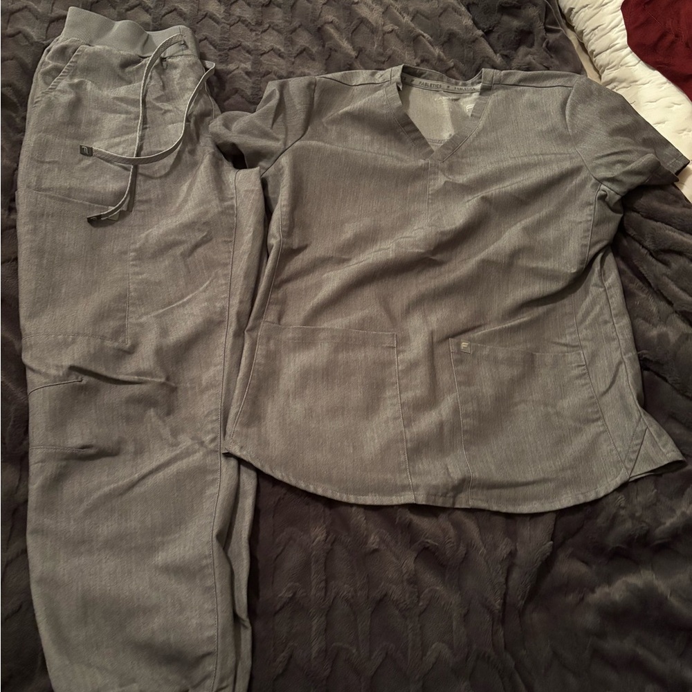 Fabletics Scrub sets. Have 4 sets.